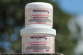 CUT-OUT Wound Cream from Rodeo Road Essentials, shown in two product jars, ideal for healing cuts, scrapes, burns, and skin repair.