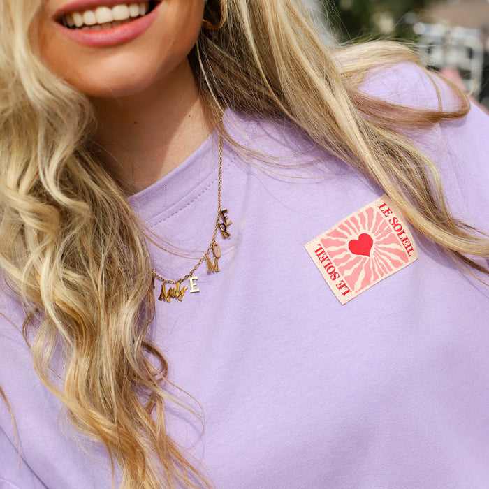 Soleil patch sweater lila